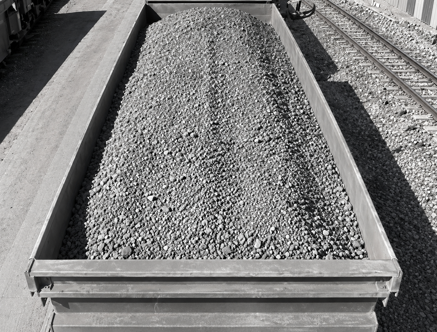 AI-generated illustration of a wagon carrying a high bulk-material load.