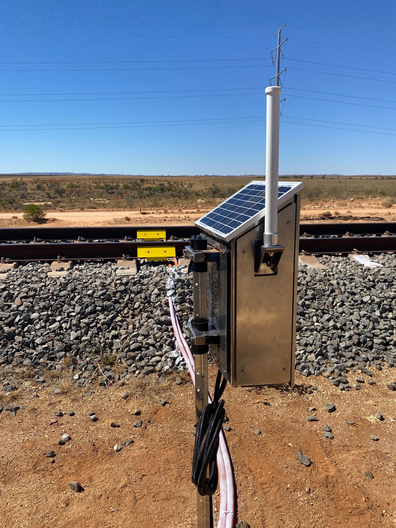 CWRM field equipment installed beside a rail line.